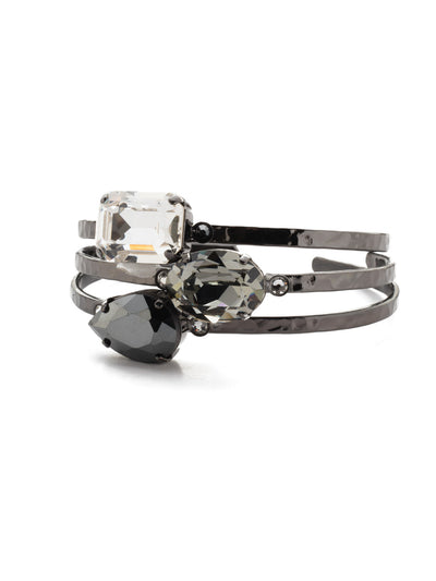 Leslie Cuff Bracelet - BEP18GMMMO - <p>Make a statement with the Leslie Cuff Bracelet. Tonal sparkling crystal in pear, oval and cushion octagon shapes showcase a variety of shades on a shining three-tier metal band. From Sorrelli's Midnight Moon collection in our Gun Metal finish.</p>