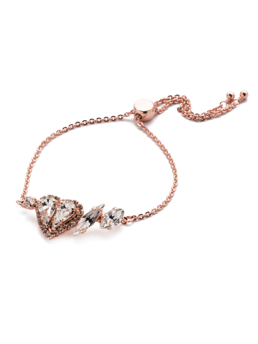 Vida Slider Bracelet - BER12RGCRY - <p>In the Vida Slider Bracelet, a classic beauty gets a bit of edge when a sparkling crystal heart is joined with interesting crystal shapes including a sharp navette stone. From Sorrelli's Crystal collection in our Rose Gold-tone finish.</p>