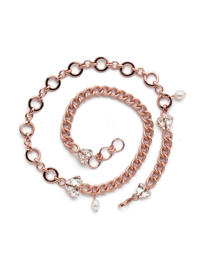 Laguna Wrap Bracelet - BER5RGCRY - <p>Loop on the Laguna Wrap Bracelet for an edgy metallic look softened by drips of freshwater pearl and pear-shaped shimmering crystals forming sweet heart shapes. From Sorrelli's Crystal collection in our Rose Gold-tone finish.</p>