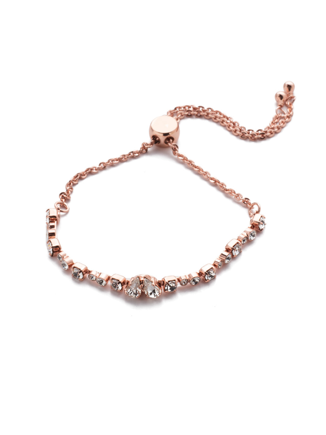 Waverly Slider Bracelet - BER7RGCRY - <p>Slip on the Waverly Slider Bracelet when you want to sparkle all day long. Circlular crystals line this piece with a heart-shape at its center. From Sorrelli's Crystal collection in our Rose Gold-tone finish.</p>