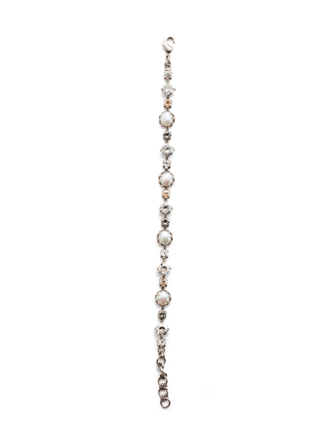 Emmanuella Tennis Bracelet - BES12ASGNS - Our Emmanuella Tennis Bracelet is proof positive that beautiful things can come in small packages. Fasten on this classic piece featuring sparkling crystals and freshwater pearls. From Sorrelli's Golden Shadow collection in our Antique Silver-tone finish.