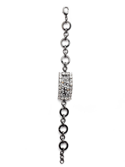 Ornella Tennis Bracelet - BES1GMGNS - Wear the Ornella Tennis Bracelet with everyday fashions to take them up a notch. The hand-soldered metal detail at its center is rimmed with sparkling crystals for a stand-out effect. From Sorrelli's Golden Shadow collection in our Gun Metal finish.