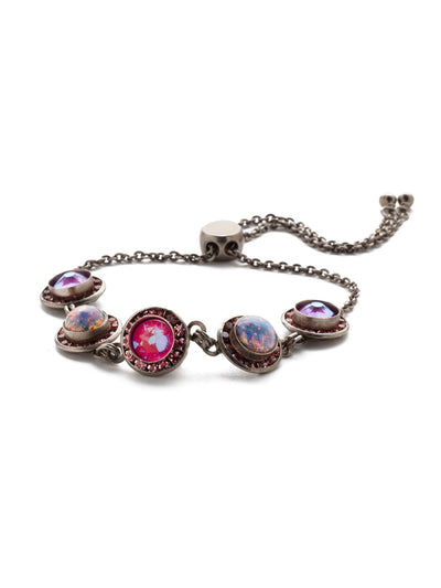 Saylor Slider Bracelet - BET14ASETP - When you're torn between a vintage and edgy look, the Saylor Slider Bracelet is your girl. With both sparkling and muted crystal pieces, it's a truly versatile piece. From Sorrelli's Electric Pink collection in our Antique Silver-tone finish.