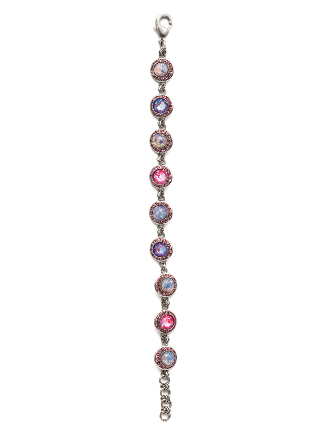Wilfred Tennis Bracelet - BET15ASETP - Ooze glamour when you wrap your wrist in the Wilfred Tennis Bracelet. Its evenly spaced sparkling crystals (rimmed in even more sparkle!) shine bright. From Sorrelli's Electric Pink collection in our Antique Silver-tone finish.