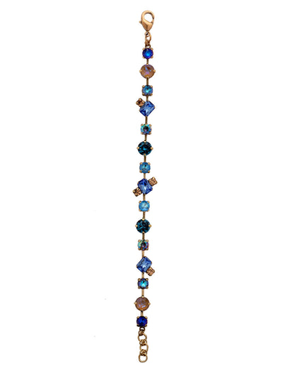 Melrose Tennis Bracelet - BET16AGVBN - <p>The Melrose Tennis Bracelet has it all when it comes to sparkling crystals: varying opacities and shades of round and emerald stones make this a beautiful piece. From Sorrelli's Venice Blue collection in our Antique Gold-tone finish.</p>