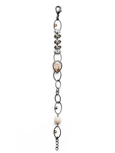 Dorothy Tennis Bracelet - BEU1GMGNS - Our Dorothy Tennis Bracelet levels up any outfit with delicate metal hoop detail accented by stunning navette crystals, a pear stone and a unique bead accent. From Sorrelli's Golden Shadow collection in our Gun Metal finish.