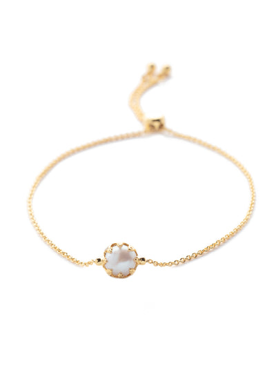 Aida Slider Bracelet - BEV155BGCRY - <p>The Aida Slider Bracelet features a single freshwater pearl on an adjustable slider chain. The dainty design makes it perfect for layering! From Sorrelli's Crystal collection in our Bright Gold-tone finish.</p>