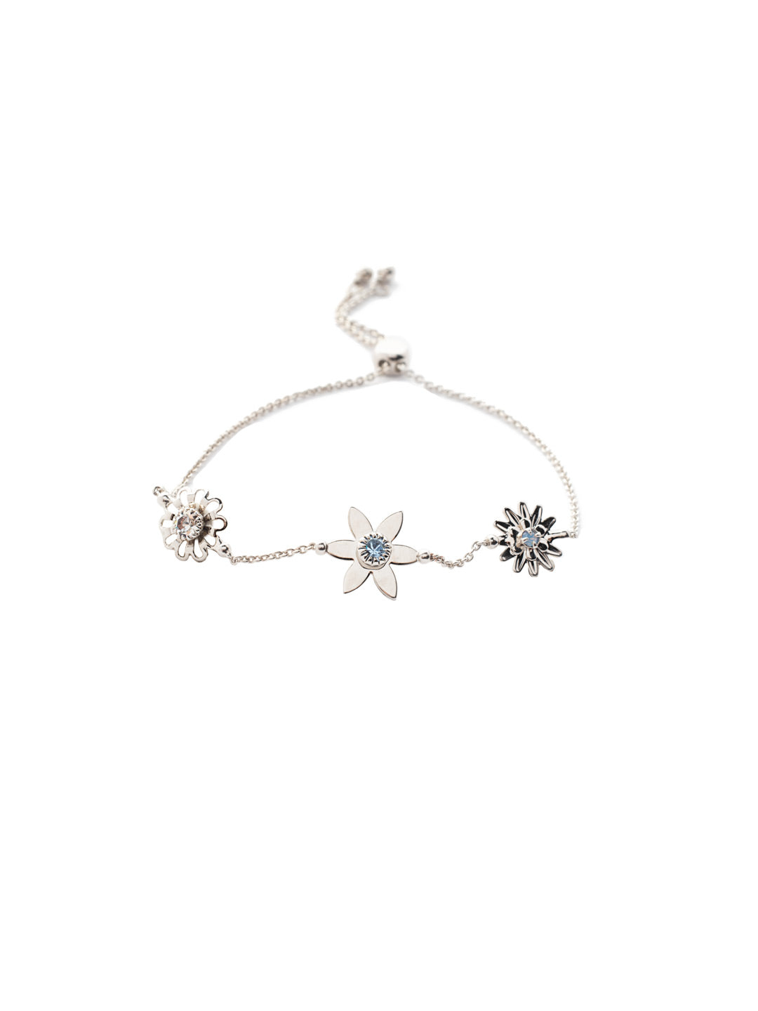 Normani Slider Bracelet - BEV1PDWNB - <p>The Normani Slider Bracelet celebrates spring with floral charm accents and crystals that shine bright. Slide it on and fit to size. From Sorrelli's Windsor Blue collection in our Palladium finish.</p>