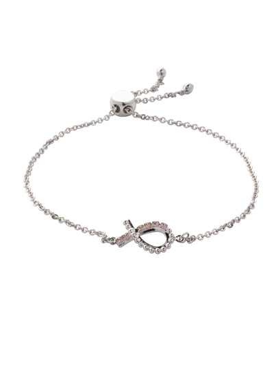 Crystal Ribbon Slider Bracelet - BEV201PDVIN - <p>The Crystal Ribbon Slider Bracelet is created and inspired by the Breast Cancer Awareness ribbon and all the warriors who wear it. Delicate crystals line a metal ribbon, creating a meaningful statement. From Sorrelli's Vintage Rose collection in our Palladium finish.</p>
