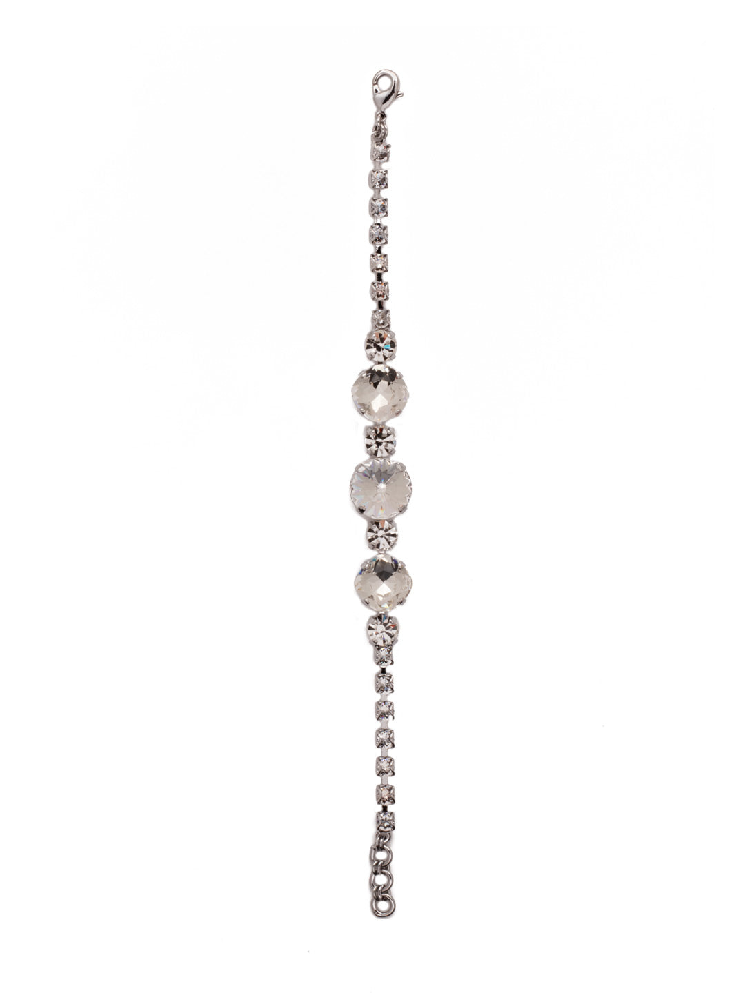 Half Circle Tennis Bracelet - BEY52PDCRY - <p>The Half Circle Tennis Bracelet adds the perfect amount of sparkle to every outfit. A crystal embellished chain connects varying sizes and colors of crystals with a lobster clasp closure. From Sorrelli's Crystal collection in our Palladium finish.</p>
