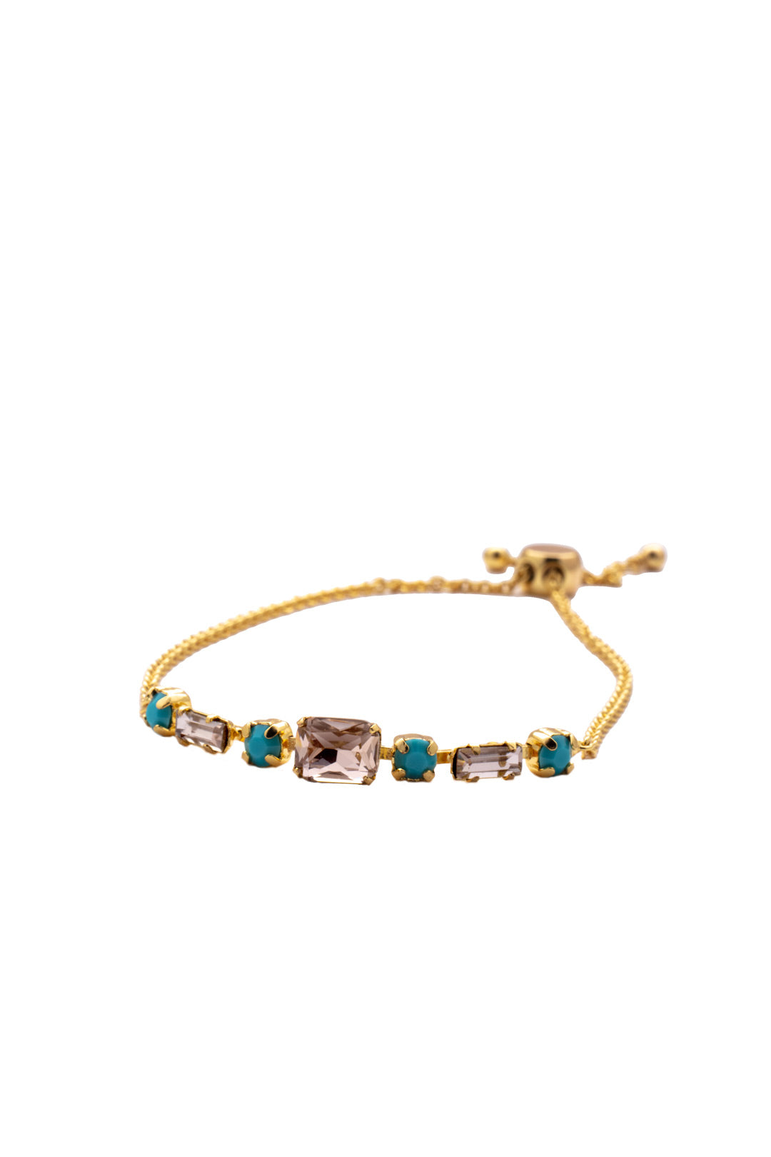 Scilla Slider Bracelet - BEZ13BGSOP - <p>The Scilla Slider Bracelet features an assortment of round, octagon, and baguette cut crystals lined halfway around a chain, secured with an adjustable slider . From Sorrelli's South Pacific collection in our Bright Gold-tone finish.</p>
