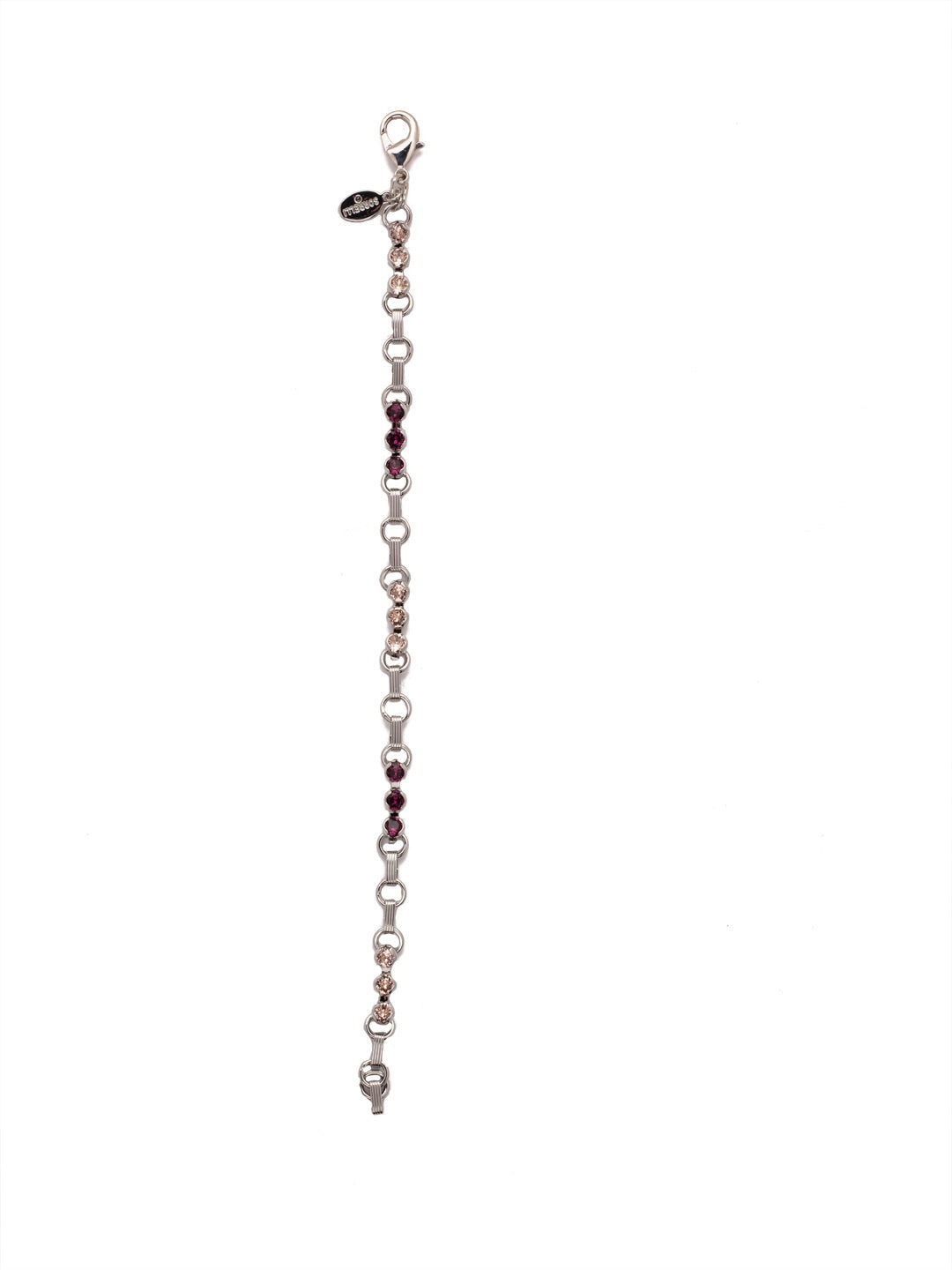 Patrice Tennis Bracelet - BEZ2PDSIP - The prongless style of the Patrice Tennis Bracelet is the hottest new Sorrelli staple. Alternating stud crystals and chain links are secured with a lobster clasp. From Sorrelli's Sienna Plum collection in our Palladium finish.