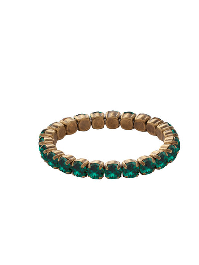 7 inch Sienna Stretch Bracelet - BFD50AGEME - <p>A modern take on a classic style, the Sienna Stretch Bracelet features a line of crystals on a sturdy jewelers' filament, stretching to fit most wrists comfortably, without the hassle of a clasp! (7 inches in diameter, fits average wrist sizes) From Sorrelli's Emerald collection in our Antique Gold-tone finish.</p>