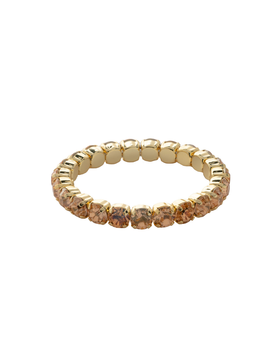 7 inch Sienna Stretch Bracelet - BFD50BGCCO - <p>A modern take on a classic style, the Sienna Stretch Bracelet features a line of crystals on a sturdy jewelers' filament, stretching to fit most wrists comfortably, without the hassle of a clasp! (7 inches in diameter, fits average wrist sizes) From Sorrelli's Caribbean Coral collection in our Bright Gold-tone finish.</p>