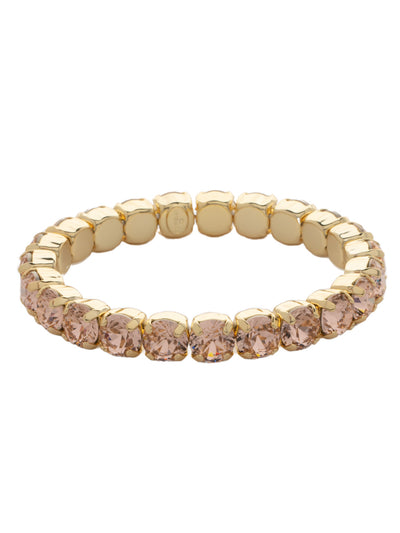 7 inch Sienna Stretch Bracelet - BFD50BGLPE - <p>A modern take on a classic style, the Sienna Stretch Bracelet features a line of crystals on a sturdy jewelers' filament, stretching to fit most wrists comfortably, without the hassle of a clasp! (7 inches in diameter, fits average wrist sizes) From Sorrelli's Light Peach collection in our Bright Gold-tone finish.</p>