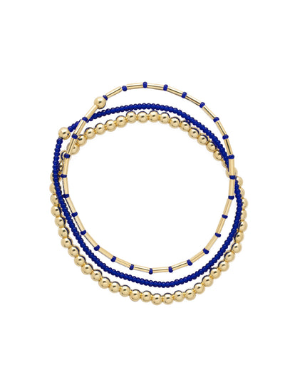Trina Stretch Bracelet - BFM5BGSAP - <p>The Trina Stretch Bracelets features 3 assorted stretch bracelets; perfect to mix, match, and stack with your favorite bracelets! From Sorrelli's Sapphire collection in our Bright Gold-tone finish.</p>