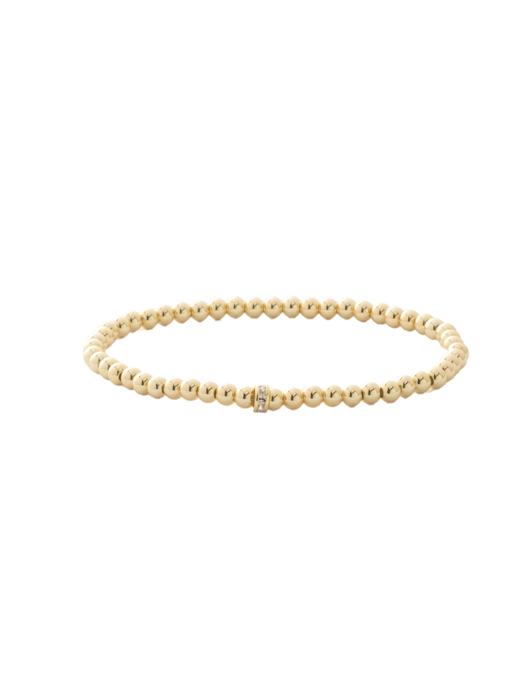 Mini Zola Charm Stretch Bracelet - BFN31BGCRY - <p>A mini take on a best-selling style, the Mini Zola Stretch Bracelet features repeating metal beads on a multi-layered stretchy jewelry filament and a single crystal embellished charm, creating a durable and trendy piece. From Sorrelli's Crystal collection in our Bright Gold-tone finish.</p>