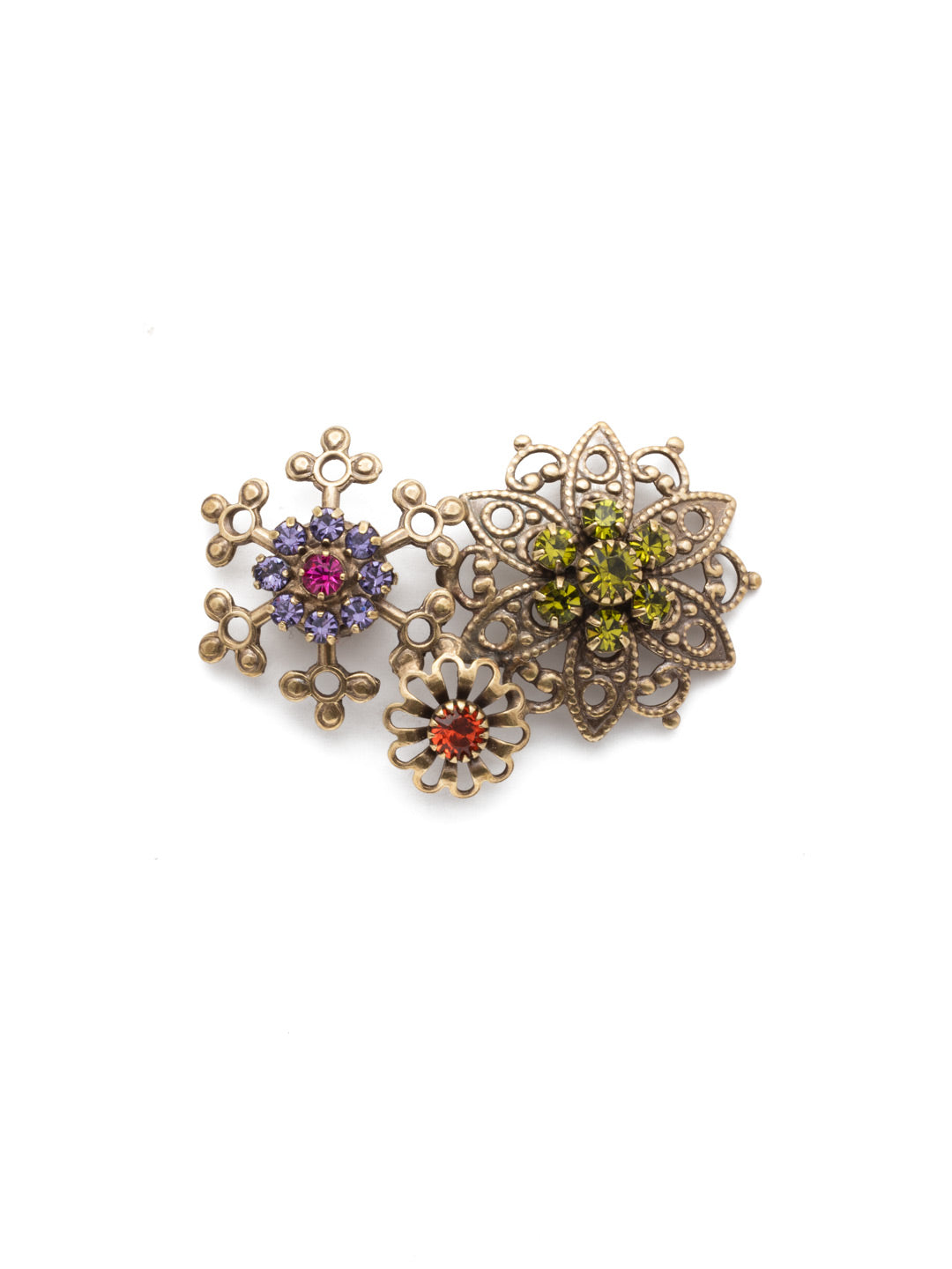 Gloria Magnetic Charm - CHM4AGMUL - <p>Designed with ornate filagree detail and a colorful array of crystals. This multi-functional accessory charm embellishment can be used to decorate, your bag, blazer, dress or refrigerator. Securely fastening with a magnet, leaving no pin holes or damage to fabric. Promptly remove charm embellishment from clothing, bag or accessory before washing. From Sorrelli's Multi  collection in our Antique Gold-tone finish.</p>