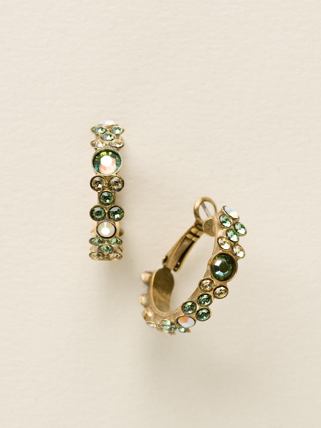 Floral Hoop Earrings - EBP15AGGA - <p>Intricate design, infused with gorgeous shine. A motif of floral clusters is featured here on a small, delicate hoop with a hinged post backing. From Sorrelli's Green Apple collection in our Antique Gold-tone finish.</p>