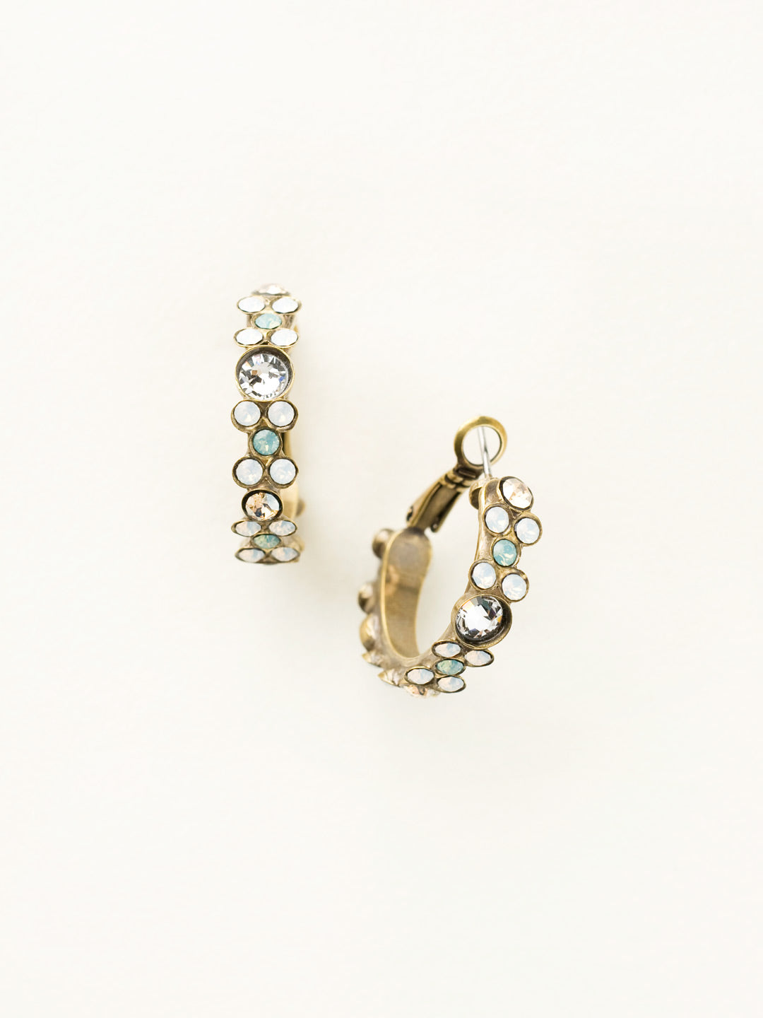 Floral Hoop Earrings - EBP15AGRIV - <p>Intricate design, infused with gorgeous shine. A motif of floral clusters is featured here on a small, delicate hoop with a hinged post backing. From Sorrelli's Riverstone collection in our Antique Gold-tone finish.</p>
