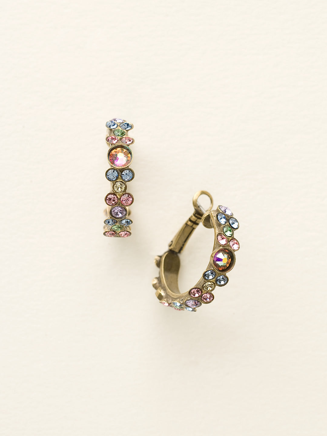 Floral Hoop Earrings - EBP15AGSPR - <p>Intricate design, infused with gorgeous shine. A motif of floral clusters is featured here on a small, delicate hoop with a hinged post backing. From Sorrelli's Spring Rain collection in our Antique Gold-tone finish.</p>