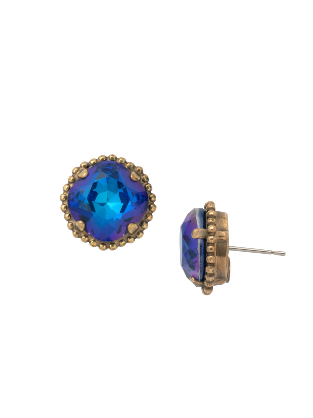 Cushion-Cut Solitaire Stud Earrings - EBX10AGVBN - <p>All around allure; the Cushion-Cut Solitaire Stud Earring features a rounded-edge, cushion cut stone that is encircled by a vintage inspired decorative, edged border. A post backing ensures comfortable, everyday wear. From Sorrelli's Venice Blue collection in our Antique Gold-tone finish.</p>
