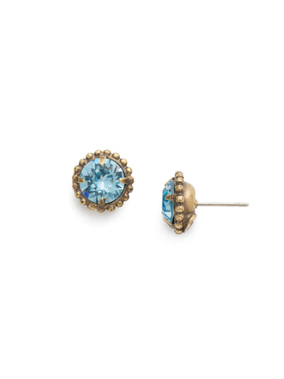 Simplicity Stud Earrings - EBY38AGAQU - <p>A timeless classic, the Simplicity Stud Earrings feature round cut crystals in a variety of colors; accented with a halo of metal beaded detail. Need help picking a stud? <a href="https://www.sorrelli.com/blogs/sisterhood/round-stud-earrings-101-a-rundown-of-sizes-styles-and-sparkle">Check out our size guide!</a> From Sorrelli's Aquamarine collection in our Antique Gold-tone finish.</p>
