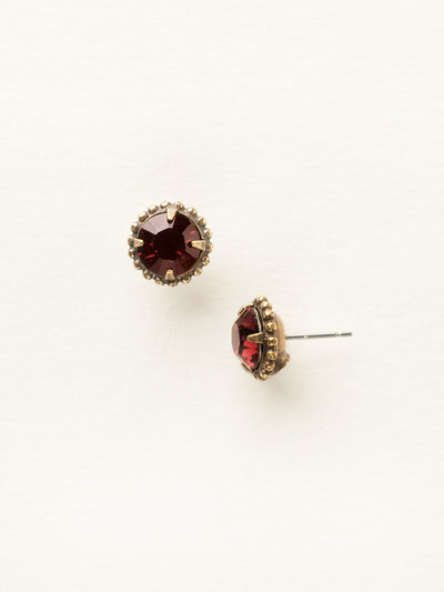Simplicity Stud Earrings - EBY38AGBUR - <p>A timeless classic, the Simplicity Stud Earrings feature round cut crystals in a variety of colors; accented with a halo of metal beaded detail. Need help picking a stud? <a href="https://www.sorrelli.com/blogs/sisterhood/round-stud-earrings-101-a-rundown-of-sizes-styles-and-sparkle">Check out our size guide!</a> From Sorrelli's Burgundy collection in our Antique Gold-tone finish.</p>