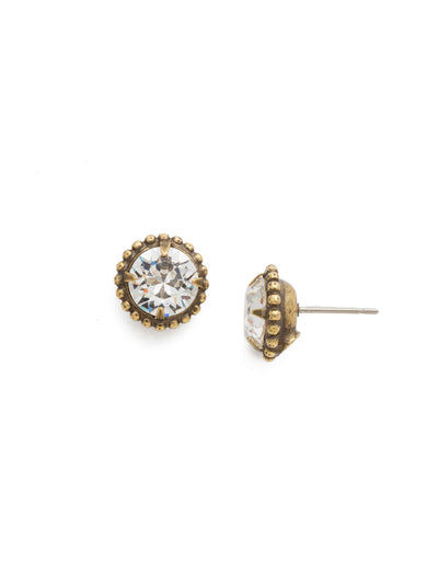 Simplicity Stud Earrings - EBY38AGCRY - <p>A timeless classic, the Simplicity Stud Earrings feature round cut crystals in a variety of colors; accented with a halo of metal beaded detail. Need help picking a stud? <a href="https://www.sorrelli.com/blogs/sisterhood/round-stud-earrings-101-a-rundown-of-sizes-styles-and-sparkle">Check out our size guide!</a> From Sorrelli's Crystal collection in our Antique Gold-tone finish.</p>