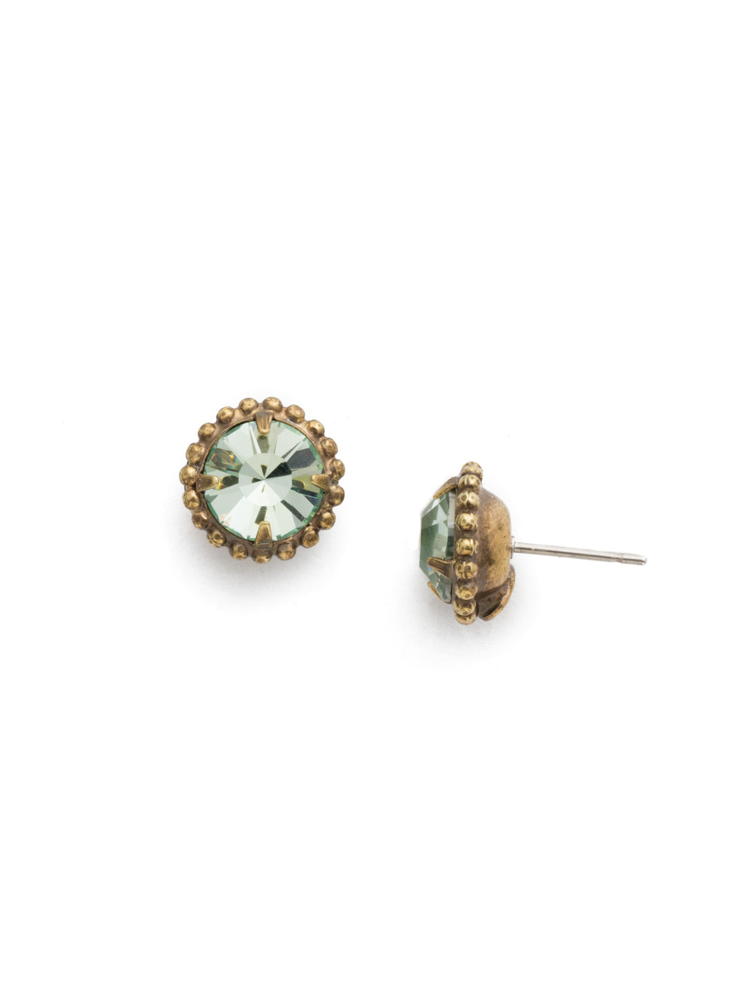 Simplicity Stud Earrings - EBY38AGMIN - <p>A timeless classic, the Simplicity Stud Earrings feature round cut crystals in a variety of colors; accented with a halo of metal beaded detail. Need help picking a stud? <a href="https://www.sorrelli.com/blogs/sisterhood/round-stud-earrings-101-a-rundown-of-sizes-styles-and-sparkle">Check out our size guide!</a> From Sorrelli's Mint collection in our Antique Gold-tone finish.</p>