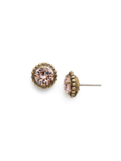Simplicity Stud Earrings - EBY38AGVIN - <p>A timeless classic, the Simplicity Stud Earrings feature round cut crystals in a variety of colors; accented with a halo of metal beaded detail. Need help picking a stud? <a href="https://www.sorrelli.com/blogs/sisterhood/round-stud-earrings-101-a-rundown-of-sizes-styles-and-sparkle">Check out our size guide!</a> From Sorrelli's Vintage Rose collection in our Antique Gold-tone finish.</p>