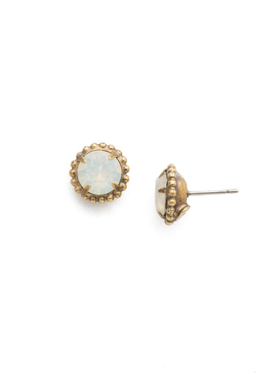 Simplicity Stud Earrings - EBY38AGWO - <p>A timeless classic, the Simplicity Stud Earrings feature round cut crystals in a variety of colors; accented with a halo of metal beaded detail. Need help picking a stud? <a href="https://www.sorrelli.com/blogs/sisterhood/round-stud-earrings-101-a-rundown-of-sizes-styles-and-sparkle">Check out our size guide!</a> From Sorrelli's White Opal collection in our Antique Gold-tone finish.</p>