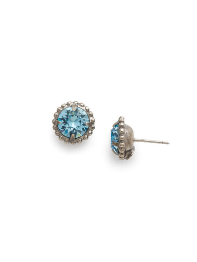 Simplicity Stud Earrings - EBY38ASAQU - <p>A timeless classic, the Simplicity Stud Earrings feature round cut crystals in a variety of colors; accented with a halo of metal beaded detail. Need help picking a stud? <a href="https://www.sorrelli.com/blogs/sisterhood/round-stud-earrings-101-a-rundown-of-sizes-styles-and-sparkle">Check out our size guide!</a> From Sorrelli's Aquamarine collection in our Antique Silver-tone finish.</p>