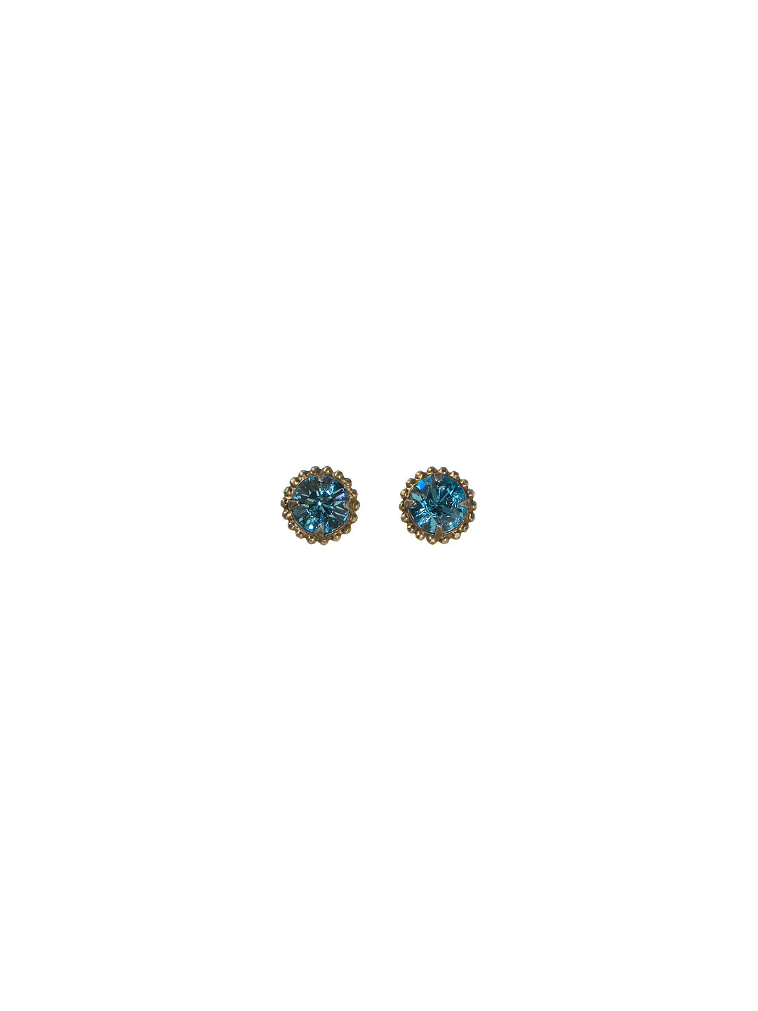 Simplicity Stud Earrings - EBY38ASOC - <p>A timeless classic, the Simplicity Stud Earrings feature round cut crystals in a variety of colors; accented with a halo of metal beaded detail. Need help picking a stud? <a href="https://www.sorrelli.com/blogs/sisterhood/round-stud-earrings-101-a-rundown-of-sizes-styles-and-sparkle">Check out our size guide!</a> From Sorrelli's Ocean collection in our Antique Silver-tone finish.</p>