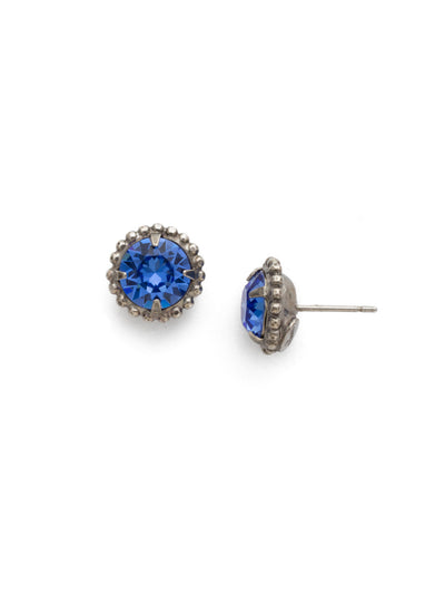 Simplicity Stud Earrings - EBY38ASSAP - <p>A timeless classic, the Simplicity Stud Earrings feature round cut crystals in a variety of colors; accented with a halo of metal beaded detail. Need help picking a stud? <a href="https://www.sorrelli.com/blogs/sisterhood/round-stud-earrings-101-a-rundown-of-sizes-styles-and-sparkle">Check out our size guide!</a> From Sorrelli's Sapphire collection in our Antique Silver-tone finish.</p>