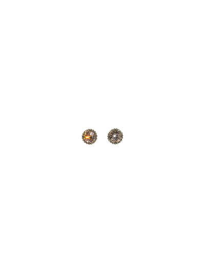 Simplicity Stud Earrings - EBY38ASSNB - <p>A timeless classic, the Simplicity Stud Earrings feature round cut crystals in a variety of colors; accented with a halo of metal beaded detail. Need help picking a stud? <a href="https://www.sorrelli.com/blogs/sisterhood/round-stud-earrings-101-a-rundown-of-sizes-styles-and-sparkle">Check out our size guide!</a> From Sorrelli's Snow Bunny collection in our Antique Silver-tone finish.</p>