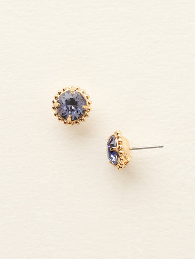 Simplicity Stud Earrings - EBY38BGTZ - <p>A timeless classic, the Simplicity Stud Earrings feature round cut crystals in a variety of colors; accented with a halo of metal beaded detail. Need help picking a stud? <a href="https://www.sorrelli.com/blogs/sisterhood/round-stud-earrings-101-a-rundown-of-sizes-styles-and-sparkle">Check out our size guide!</a> From Sorrelli's Tanzanite Crystal collection in our Bright Gold-tone finish.</p>