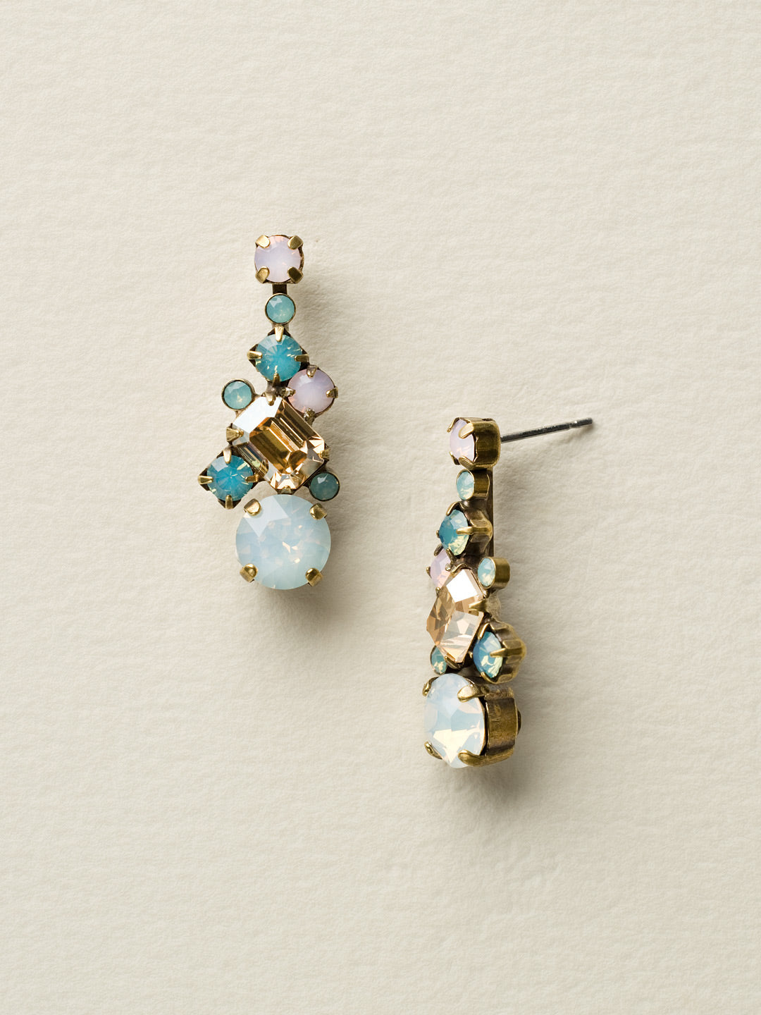 Glittering Multi-Cut Crystal Earring - ECF6AGROW - <p>Where simple meets stunning. This delicate drop earring features a central emerald cut crystal surrounded by clusters of smaller, round stones. From Sorrelli's Rose Water collection in our Antique Gold-tone finish.</p>