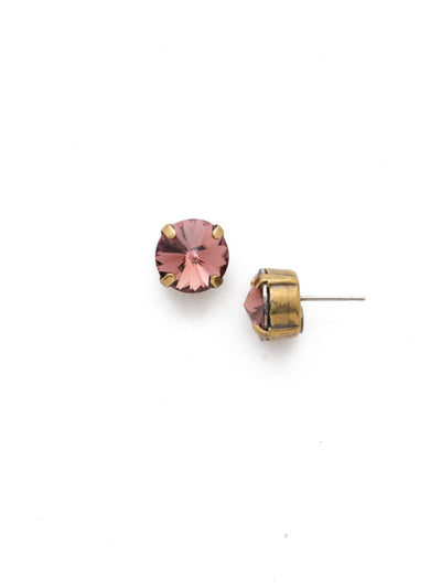 London Stud Earrings - ECM14AGBUR - <p>Everyone needs a great pair of studs. Add some classic sparkle to any occasion with these stud earrings. Need help picking a stud? <a href="https://www.sorrelli.com/blogs/sisterhood/round-stud-earrings-101-a-rundown-of-sizes-styles-and-sparkle">Check out our size guide!</a> From Sorrelli's Burgundy collection in our Antique Gold-tone finish.</p>