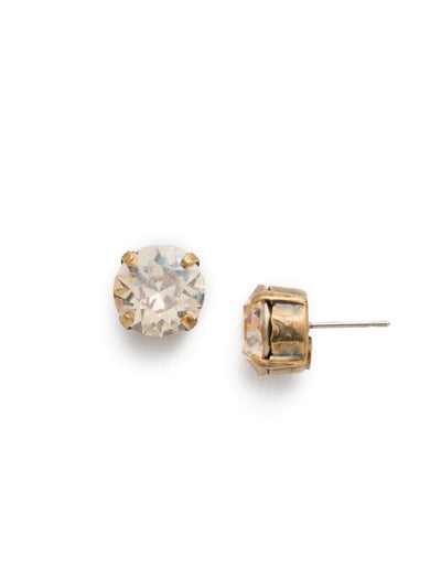 London Stud Earrings - ECM14AGDCH - <p>Everyone needs a great pair of studs. Add some classic sparkle to any occasion with these stud earrings. Need help picking a stud? <a href="https://www.sorrelli.com/blogs/sisterhood/round-stud-earrings-101-a-rundown-of-sizes-styles-and-sparkle">Check out our size guide!</a> From Sorrelli's Dark Champagne collection in our Antique Gold-tone finish.</p>