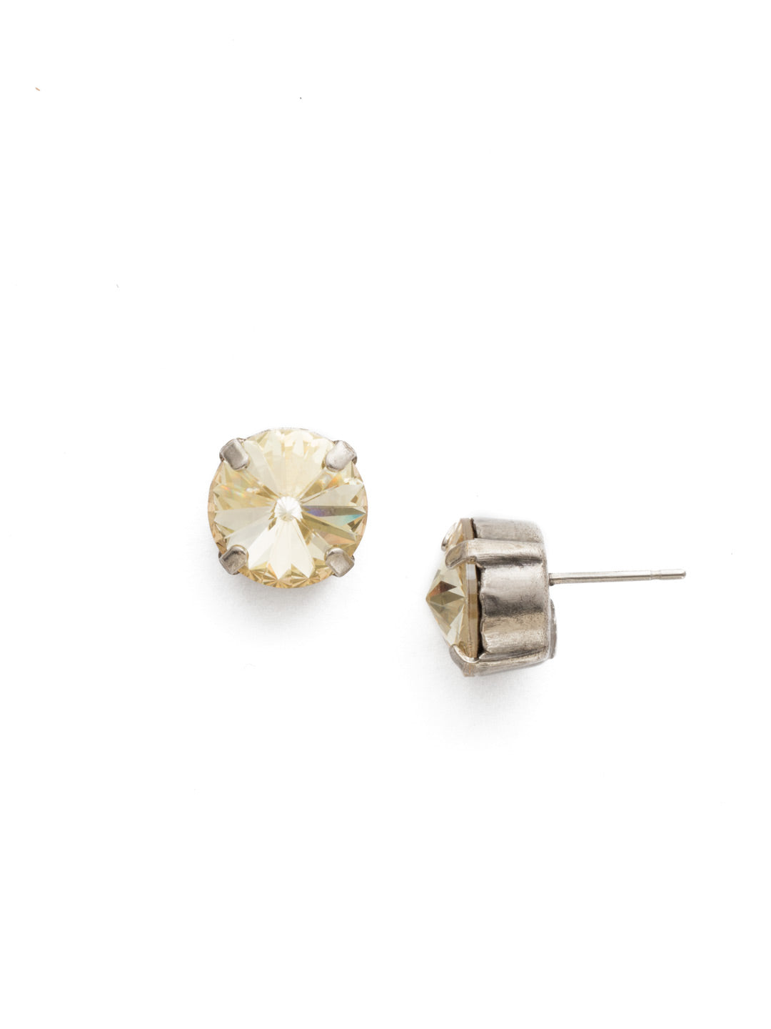 London Stud Earrings - ECM14ASCCH - <p>Everyone needs a great pair of studs. Add some classic sparkle to any occasion with these stud earrings. Need help picking a stud? <a href="https://www.sorrelli.com/blogs/sisterhood/round-stud-earrings-101-a-rundown-of-sizes-styles-and-sparkle">Check out our size guide!</a> From Sorrelli's Crystal Champagne collection in our Antique Silver-tone finish.</p>