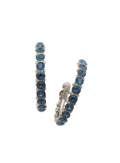 Heavenly Hoop Earrings - ECQ24ASBTB - <p>Gemstones cover the outside of these hoop earrings. Their simple style combined with the sparkle of the jewels makes it the perfect staple piece for your jewelry box. From Sorrelli's Battle Blue collection in our Antique Silver-tone finish.</p>