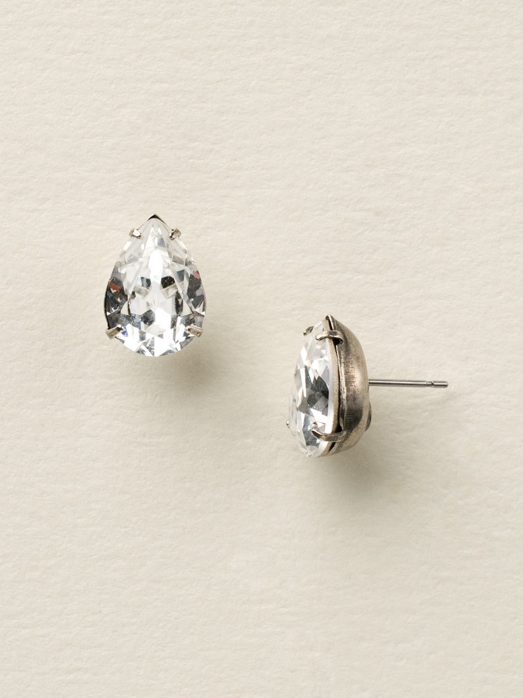 Ginnie Stud Earrings - ECR115ASCCL - <p>A beautiful basic stud. These classic single teardrop post earrings are perfect for any occasion, especially the everyday look. A timeless treasure that will sparkle season after season. From Sorrelli's Crystal Clear collection in our Antique Silver-tone finish.</p>