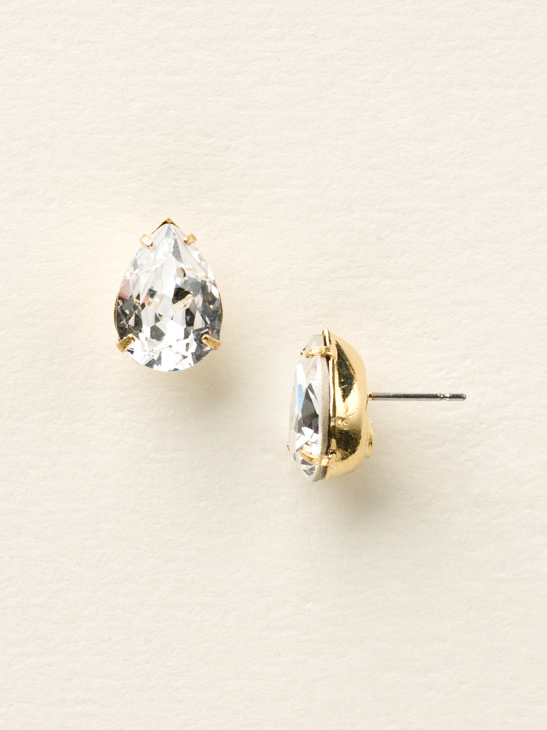 Ginnie Stud Earrings - ECR115BGCCL - <p>A beautiful basic stud. These classic single teardrop post earrings are perfect for any occasion, especially the everyday look. A timeless treasure that will sparkle season after season. From Sorrelli's Crystal Clear collection in our Bright Gold-tone finish.</p>