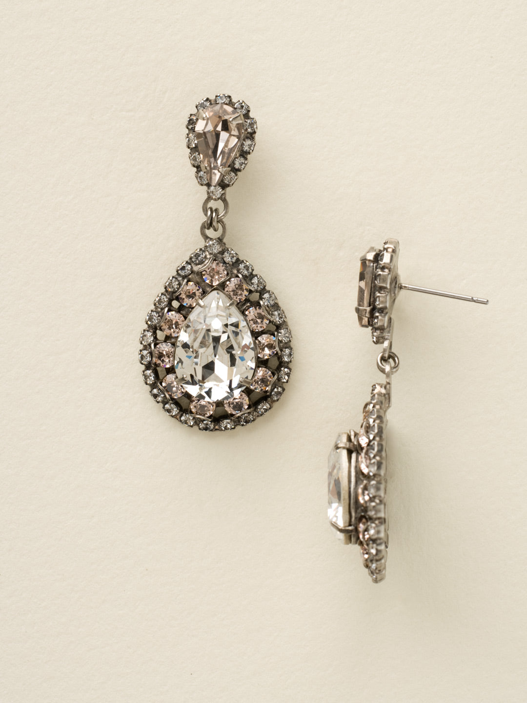 Oval Encrusted Crystal Dangle Earrings - ECW47ASSNB - <p>These oval earrings will pair perfectly with that classic updo! Teardrop crystals are the center of this brilliant statement earring. From Sorrelli's Snow Bunny collection in our Antique Silver-tone finish.</p>
