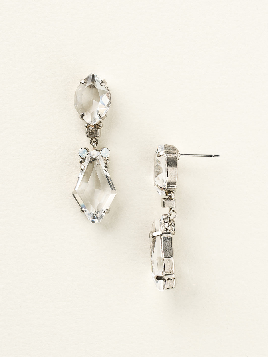 Pointed Pear and Diamond Cut Crystal Drop Earring - ECZ1ASWBR - <p>These drop earrings feature a diamond cut crystal draped below a pointed pear stone. With decorative round stones and translucent multi-cut crystals, this pair of posts is sure to catch every ray of light. From Sorrelli's White Bridal collection in our Antique Silver-tone finish.</p>