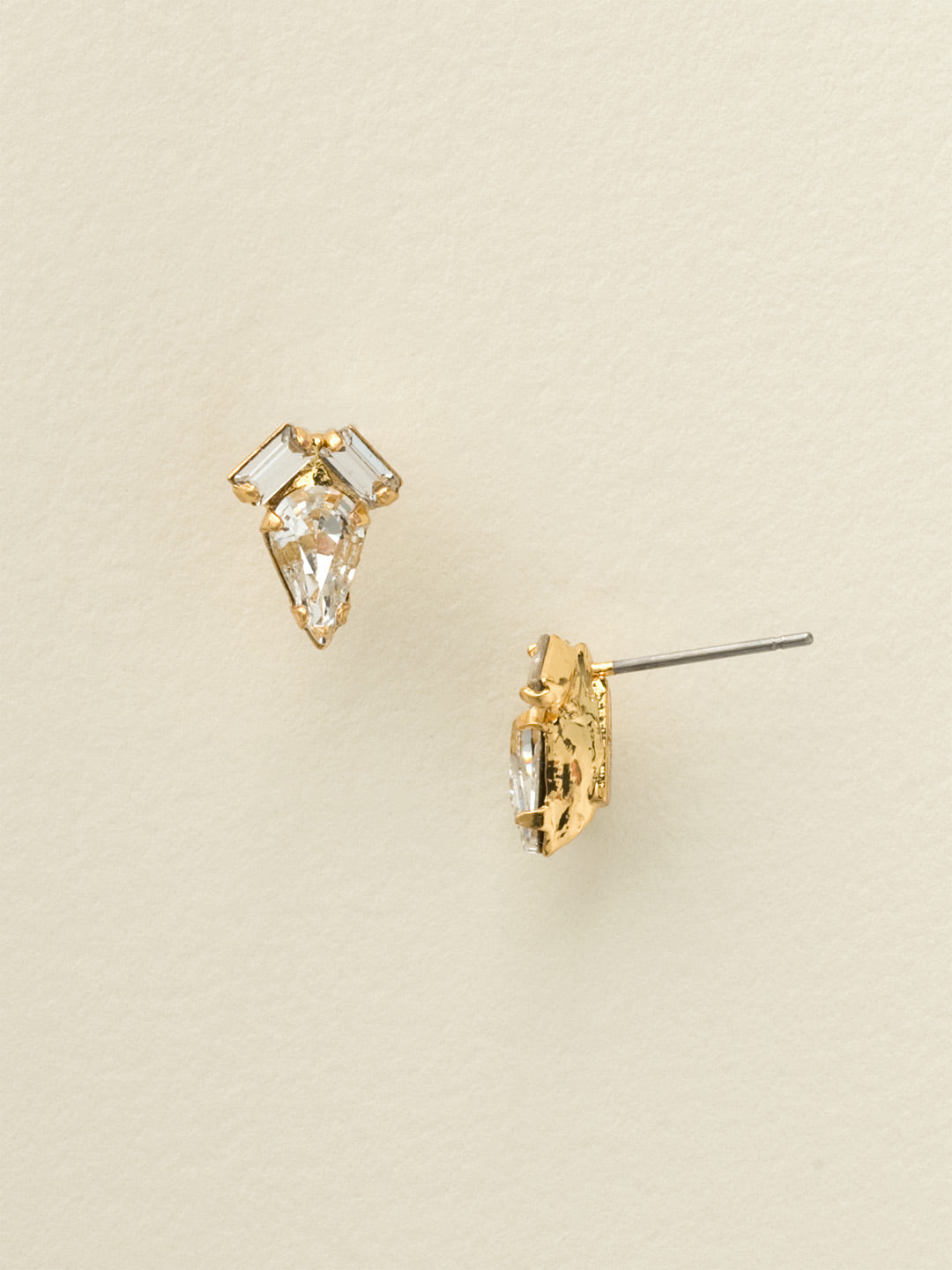 Petite Teardrop and Baguette Post Earring - EDC1BGCRY - <p>These sweet baubles feature a small, teardrop crystal accentuated by two crystal baguettes. Just the way to add a little subtle sparkle to your look. From Sorrelli's Crystal collection in our Bright Gold-tone finish.</p>