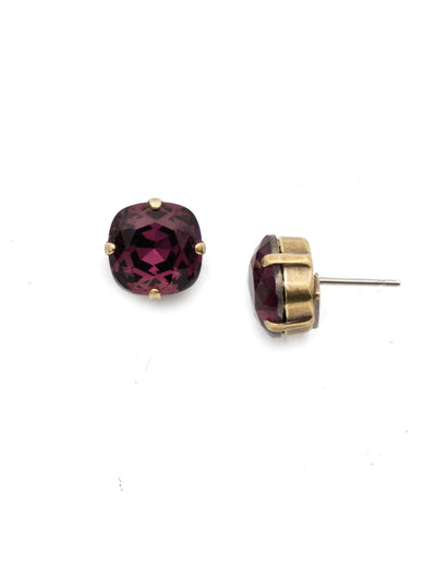 Halcyon Stud Earrings - EDH25AGAM - A beautiful, luminous cushion-cut crystal in a classic four-pronged setting that's ideal for everyday wear. From Sorrelli's Amethyst collection in our Antique Gold-tone finish.