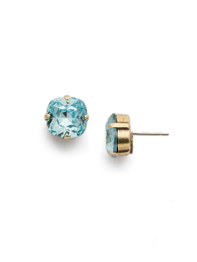 Halcyon Stud Earrings - EDH25AGAQU - <p>A beautiful, luminous cushion-cut crystal in a classic four-pronged setting that's ideal for everyday wear. From Sorrelli's Aquamarine collection in our Antique Gold-tone finish.</p>
