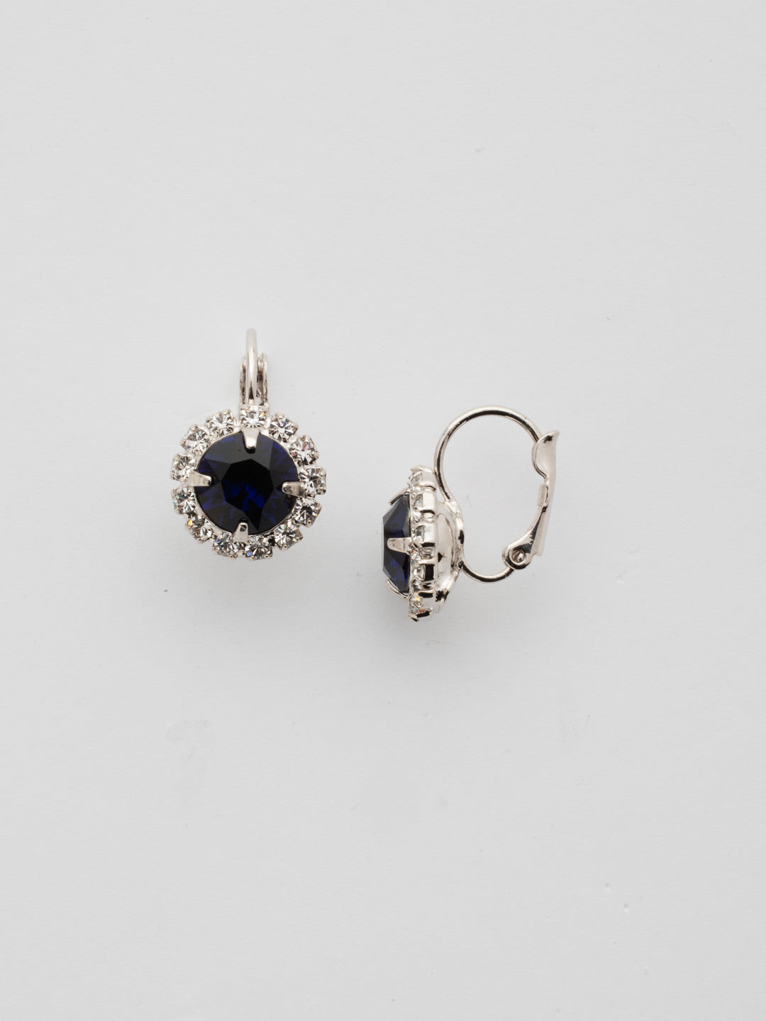 Haute Halo Dangle Earrings - EDL10RHDI - <p>A central round crystal with an elegant halo of gems embodies elegance and style. From Sorrelli's Dark Indigo collection in our Palladium Silver-tone finish.</p>